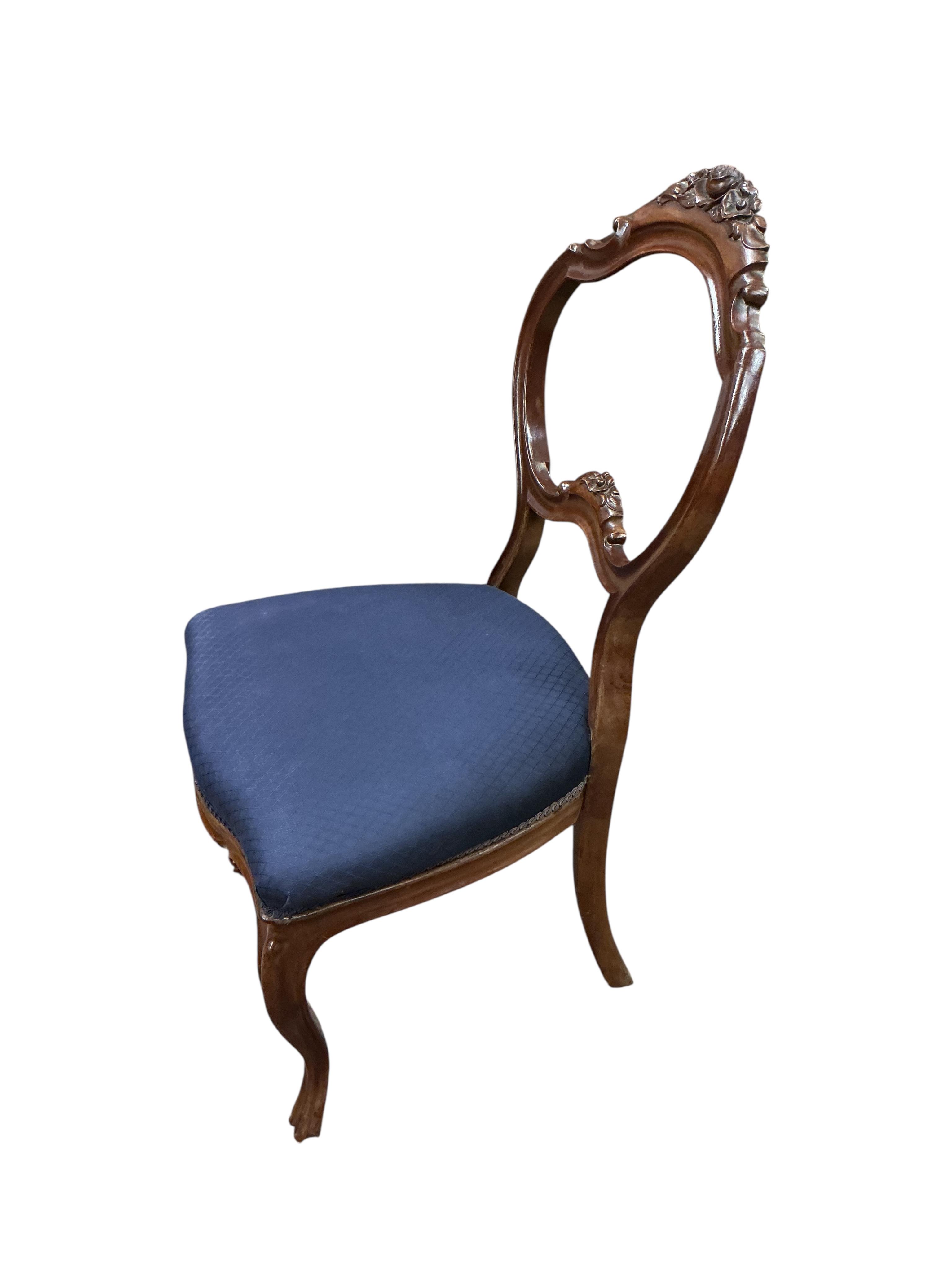 A set of six 19th century French carved mahogany balloon back dining chairs, width 46cm, height 96cm